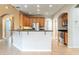 Bright and airy kitchen with a breakfast bar, granite countertops, and stainless steel appliances at 2780 Running Springs Loop, Oviedo, FL 32765