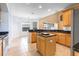 Spacious kitchen featuring granite countertops, an island, and stainless steel appliances at 2780 Running Springs Loop, Oviedo, FL 32765