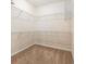 A walk-in closet featuring carpet floors and wire shelving for maximum storage and organization at 2780 Running Springs Loop, Oviedo, FL 32765