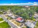 A high-angle shot of the house showing its yard, new roof, and neighborhood at 288 N Seneca St, Daytona Beach, FL 32114