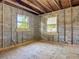 Garage under construction, framed with concrete walls and windows for natural light at 288 N Seneca St, Daytona Beach, FL 32114