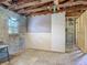 Garage under construction with new walls and framing, offering potential for customization at 288 N Seneca St, Daytona Beach, FL 32114