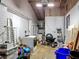 Tidy garage space featuring washer, dryer, equipment, and ample storage at 288 N Seneca St, Daytona Beach, FL 32114