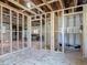 Partially framed garage with plywood flooring offering potential for customization at 288 N Seneca St, Daytona Beach, FL 32114