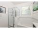Clean and modern bathroom featuring a separate shower and a soaking tub at 2952 Boating Blvd, Kissimmee, FL 34746