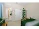 Comfortable bedroom with closet, ceiling fan, and natural light from a window at 2952 Boating Blvd, Kissimmee, FL 34746
