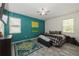 Stylish bedroom with a comfortable bed, soft rug, and modern decor at 2952 Boating Blvd, Kissimmee, FL 34746
