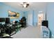 Bright bedroom with a window, ceiling fan, and comfortable workspace at 2952 Boating Blvd, Kissimmee, FL 34746