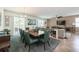 Elegant dining area with seating for ten and access to a private lanai at 2952 Boating Blvd, Kissimmee, FL 34746