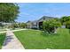 Charming single-story home with well-kept lawn and exterior landscaping at 2952 Boating Blvd, Kissimmee, FL 34746