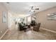 Spacious living room with tile flooring, comfortable seating, and neutral paint at 2952 Boating Blvd, Kissimmee, FL 34746