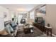 Inviting living room featuring a comfortable leather sofa and contemporary decor at 2952 Boating Blvd, Kissimmee, FL 34746