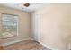 Neutral bedroom with hardwood floors, ample natural light, and closet for storage at 3385 Lake Harney Cir, Geneva, FL 32732