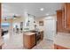 Charming kitchen with wood cabinets, granite counters, and an open layout for entertaining at 3385 Lake Harney Cir, Geneva, FL 32732