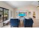 Comfortable living room with hardwood floors, vaulted ceilings, and a large entertainment center at 3385 Lake Harney Cir, Geneva, FL 32732