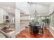 Dining area features high ceilings, pendant lighting and natural light at 343 Raleigh Pl, Oviedo, FL 32765