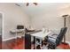 Office area with sewing machines, tables, and natural light at 343 Raleigh Pl, Oviedo, FL 32765