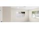 Inviting bedroom featuring neutral walls and bright windows for natural lighting at 4604 S Shore Rd, Orlando, FL 32839