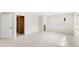 Bright bedroom with fresh paint, tile floors, closet with built ins, and large windows at 4604 S Shore Rd, Orlando, FL 32839