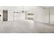Open-concept living area features sliding barn doors and contemporary lighting at 4604 S Shore Rd, Orlando, FL 32839