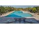 Large community pool perfect for relaxation and recreation with ample lounge seating at 5126 Rishley Run Way, Mount Dora, FL 32757