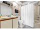 Well-maintained bathroom with a shower-tub combo and sleek vanity, offering comfort and style at 543 Azinger Cir, Orlando, FL 32824