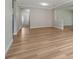 Open-concept space with new floors and neutral color scheme at 5839 Tarleton Way, Mount Dora, FL 32757