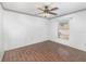 Bedroom with wood-look flooring, and decorative border that accents the room at 6019 Long Peak Dr, Orlando, FL 32810