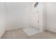 Bright foyer with neutral carpet and a soaring ceiling with a large round window at 6019 Long Peak Dr, Orlando, FL 32810