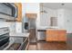 Bright kitchen with stainless steel appliances at 6019 Long Peak Dr, Orlando, FL 32810