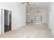 Spacious living room with high ceilings, ceiling fan, and natural light at 6019 Long Peak Dr, Orlando, FL 32810