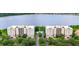 The view showcases two lakeside condos, with a central pool, tree-lined streets, and a calm lake as a serene backdrop at 6336 Buford St # 307, Orlando, FL 32835