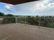 Balcony has a water view with lots of foliage at 6336 Buford St # 307, Orlando, FL 32835