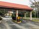 Covered entrance with 'Lobby' and 'Slow' signs for a community at 6403 Parc Corniche Dr # 4308, Orlando, FL 32821