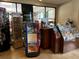 Community gift shop with sunglasses, souvenirs, and travel guides at 6403 Parc Corniche Dr # 4308, Orlando, FL 32821