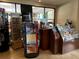 Community gift shop with sunglasses, souvenirs, and travel guides at 6403 Parc Corniche Dr # 4308, Orlando, FL 32821