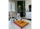 Bright living room featuring cheerful decor, comfortable seating, and charming home accents at 6403 Parc Corniche Dr # 4308, Orlando, FL 32821