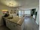 Spacious open-concept living space with dining area, kitchen, and a comfortable seating arrangement at 6403 Parc Corniche Dr # 4308, Orlando, FL 32821