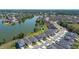 Overhead view of a home in a lakeside community, with an active green pin location indicator at 6728 Great Bear Dr, Lakeland, FL 33805