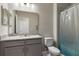 Bathroom features modern vanity with granite countertop, toilet and shower at 6728 Great Bear Dr, Lakeland, FL 33805