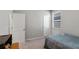 Cozy bedroom with plush carpet, neutral paint and a window for ample natural lighting at 6728 Great Bear Dr, Lakeland, FL 33805