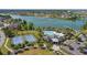 Enjoy community amenities with a pool, tennis court, playground, and lake access at 6728 Great Bear Dr, Lakeland, FL 33805