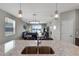 Modern open kitchen with stainless appliances, granite countertops, a large island, and a dining/living room combination at 6728 Great Bear Dr, Lakeland, FL 33805