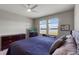 Bright main bedroom featuring waterfront views from large windows at 6728 Great Bear Dr, Lakeland, FL 33805