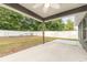 Covered patio with a view of the fenced-in backyard at 7101 Se 124Th St, Belleview, FL 34420