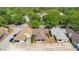 Aerial view of charming homes with well-kept yards and convenient parking at 720 Lakeside Dr, Winter Springs, FL 32708