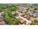 Expansive aerial view highlighting a sprawling neighborhood with varied home styles and mature trees at 720 Lakeside Dr, Winter Springs, FL 32708