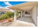 Close up of a charming carport, front yard garden, and inviting walkway leading to the home's entrance at 720 Lakeside Dr, Winter Springs, FL 32708
