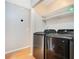 Well-equipped laundry room with modern washer and dryer units at 720 Lakeside Dr, Winter Springs, FL 32708