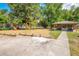 Community playground featuring a swing set, slide and picnic pavilion at 720 Lakeside Dr, Winter Springs, FL 32708
